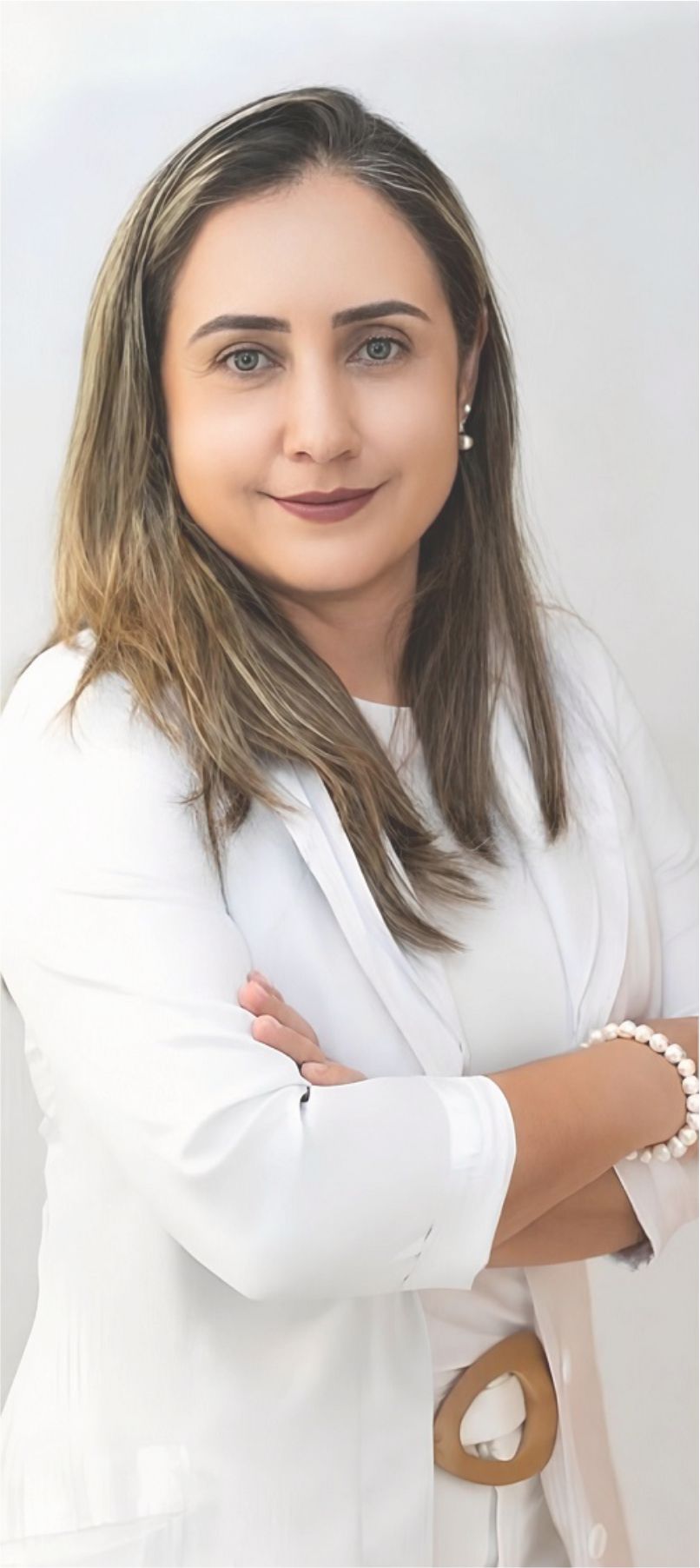 Dra. Grazielle Faria atendendo com estetoscópio